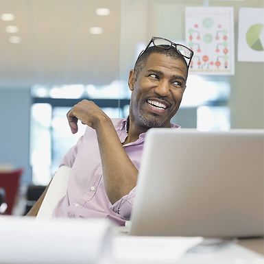 Man at a computer in an office